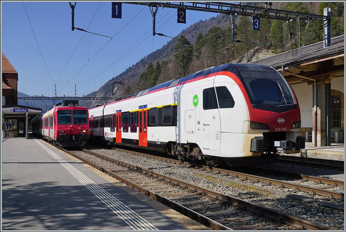 The SBB RABe 523 108 and in the backgroud a TRAVAY local train to Le Brassus in Vallorbe. 

24.03.2022