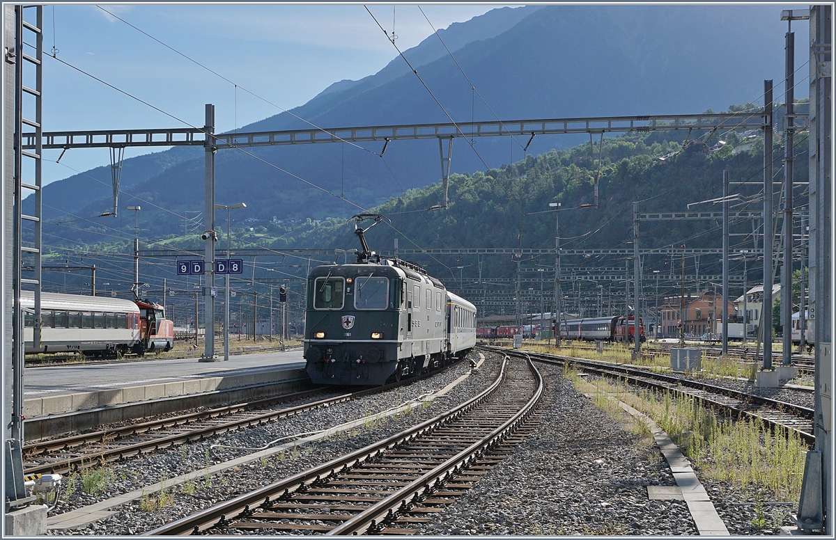 The SBB Re 4/4 II 11161 is arriving wiht his IR from Iselle at Brig. 

19.08.2020 