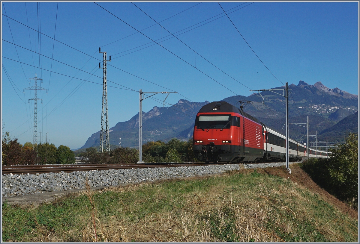 The SBB Re 460 005-5 with an IR to Brig near Bex.
