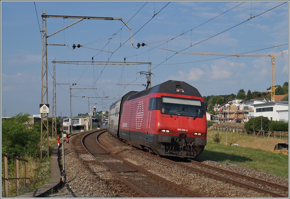 The SBB Re 460 024-3 with an IC to St Gallen by Neyruz. 
06.08.2015