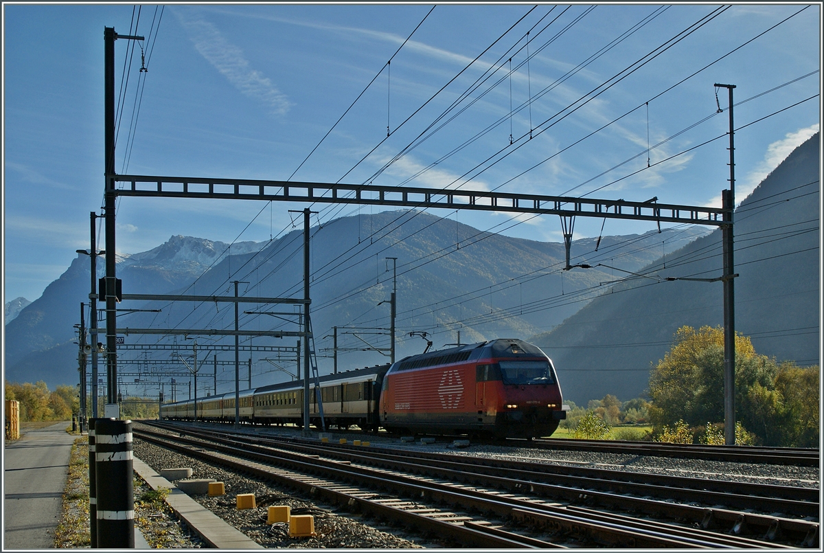 The SBB Re 460 070-4 with an IR to Genève Aéreoport by the Lötschberg-Tunnel (LBT) Junction near Visp. 

7.11.2013