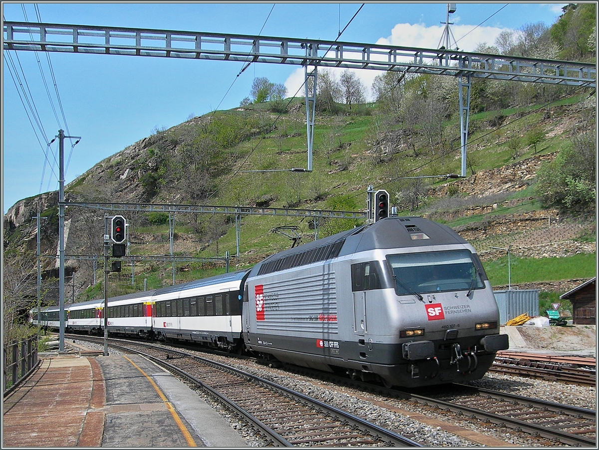 The SBB Re 460 107-6 wiht an IC in Direction to Bern in Ausserberg.