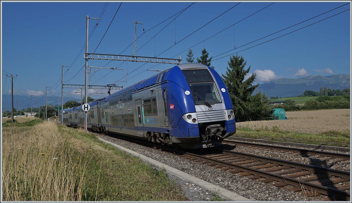 The SNCF 24633  Compter Mouse  by Satigny (CH) on the way to Grenoble. 

19.07.2021