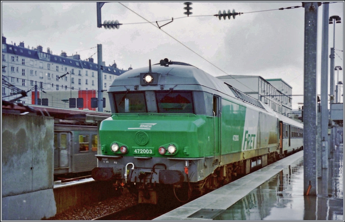 The SNCF CC 72 003 wiht a fast train service in the Paris Nord station. 

analog picture 14.02.2002