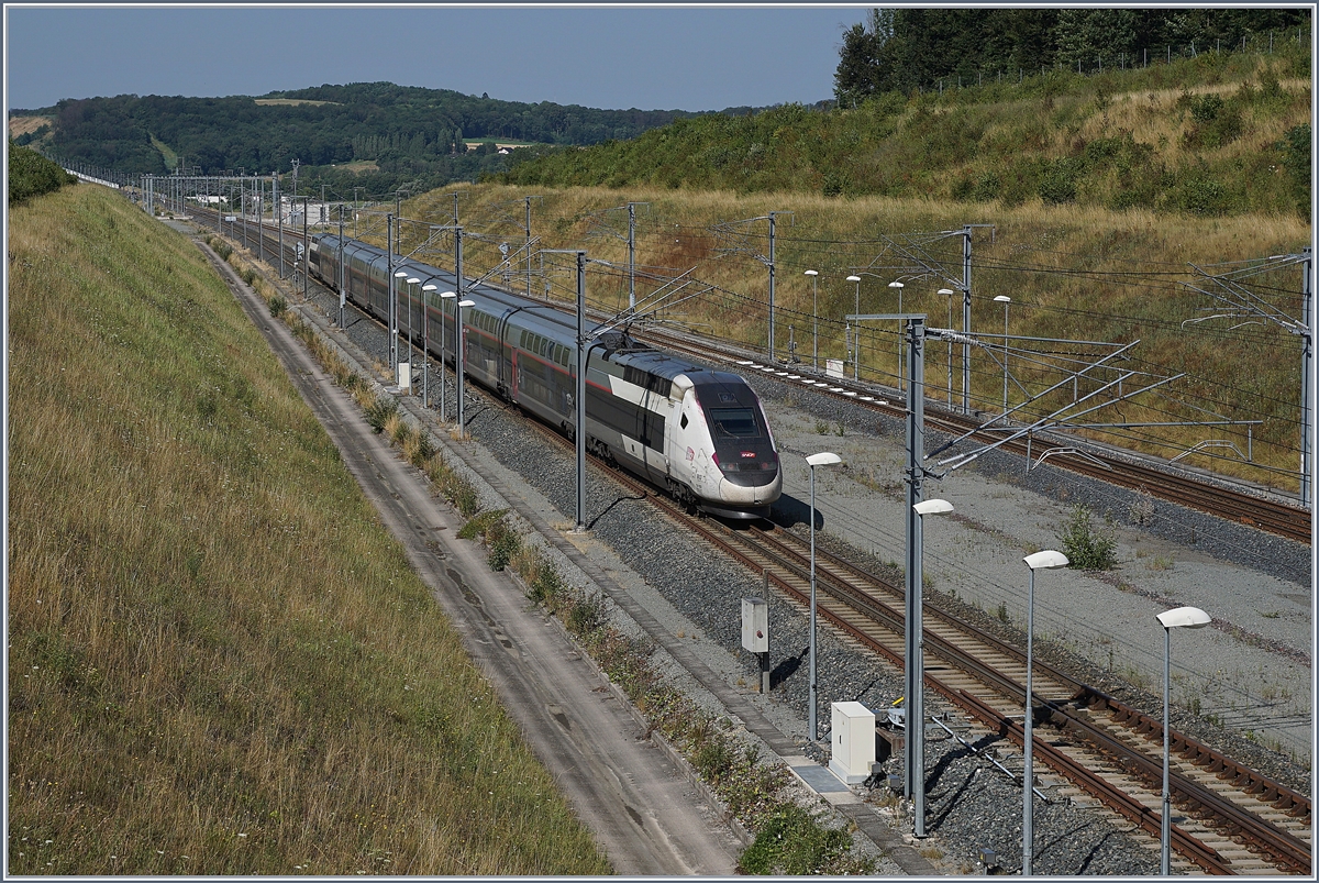 The TGV 9880 on the way from Luxembourg to Montpellier by the the Belfort Montbéliard TGV Station. 

23.07.2019