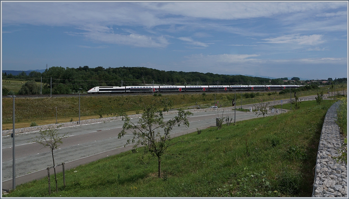 The TGV 9896 from Montpellier to Luxemburg near his next stop Belfort Montbeliard TGV.

06.07.2019