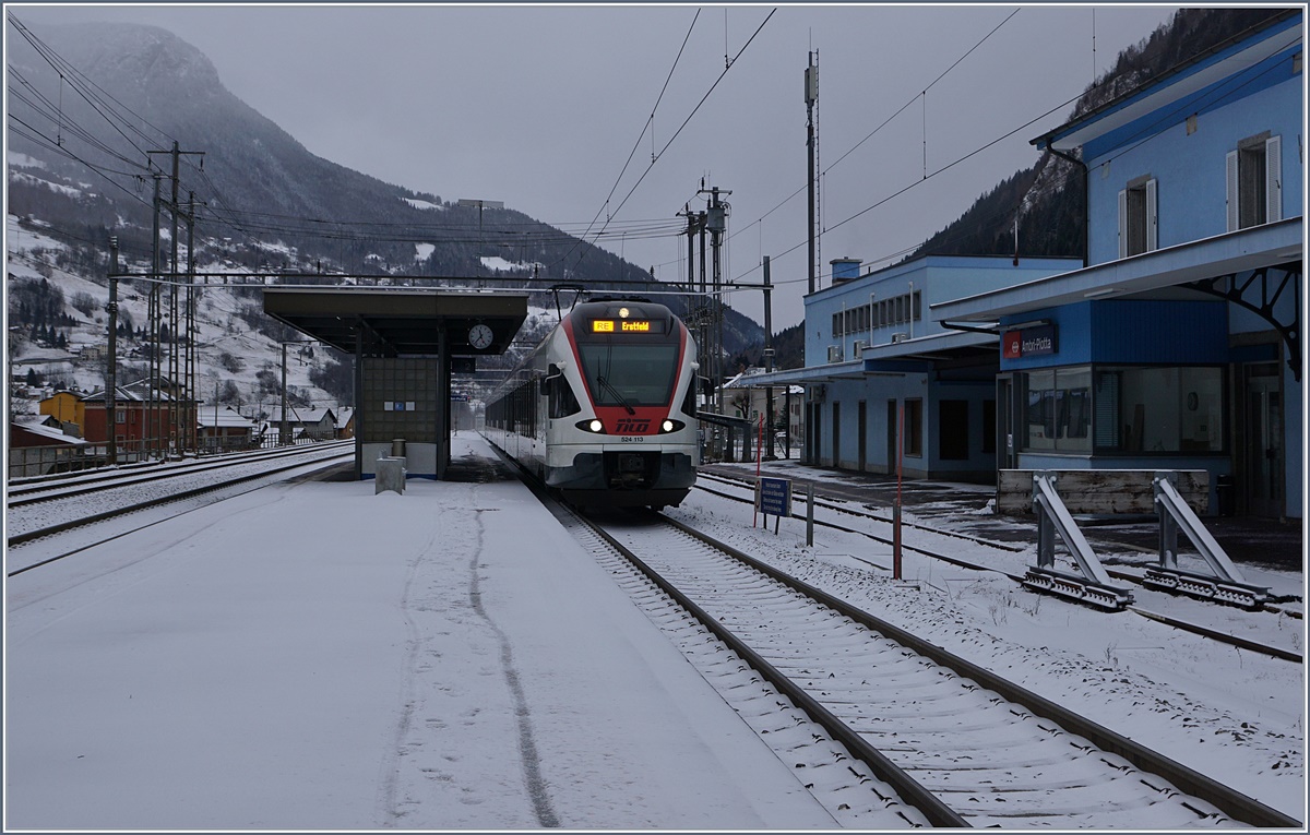 The TILO RABe 524 113 on the way to Erstfeld by his stop in Ambri-Piotta.
05.01.2017