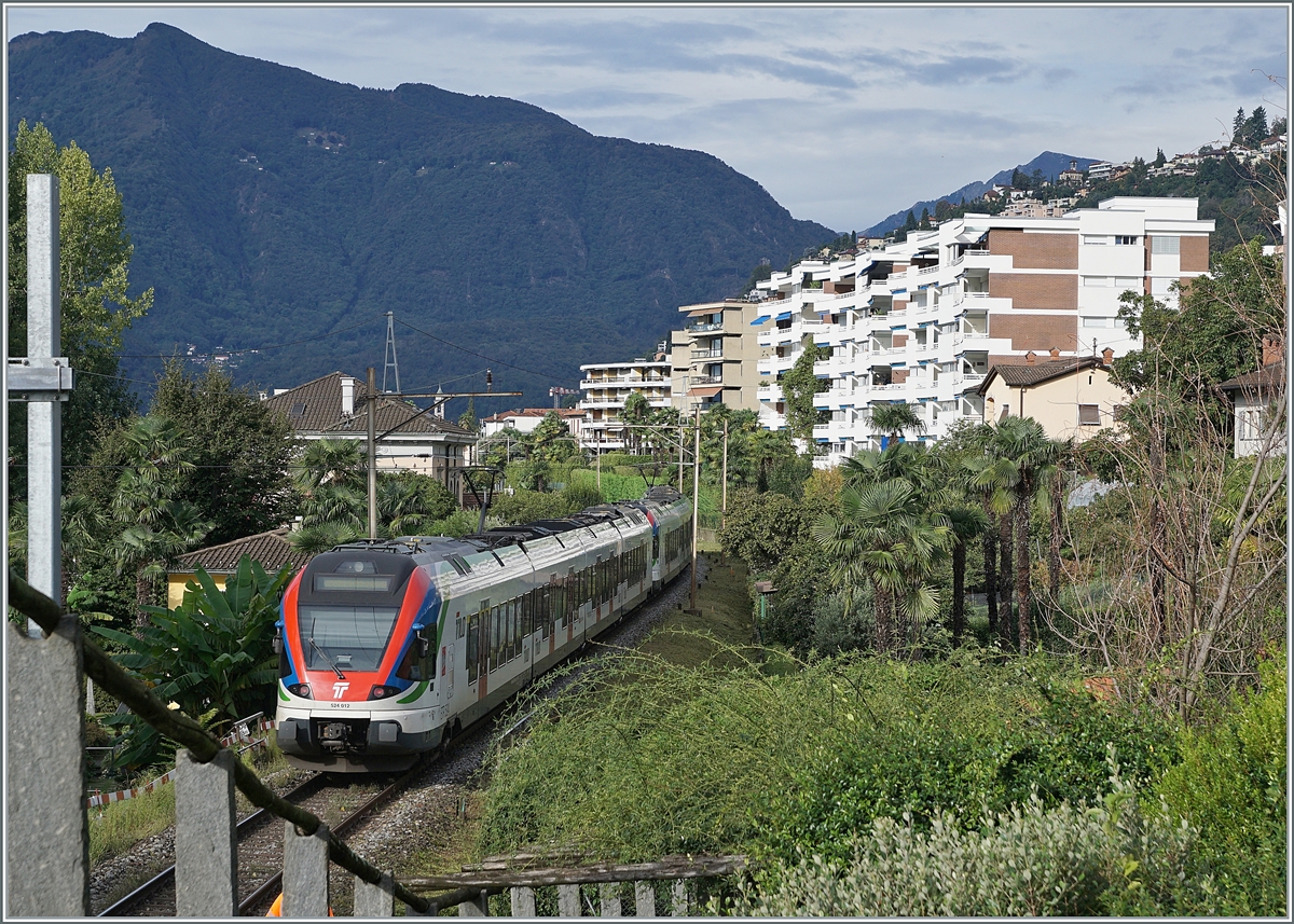 The TILO RAe 524 018 and 012 on the way to Locarno by San Quirico. 

20.09.2021