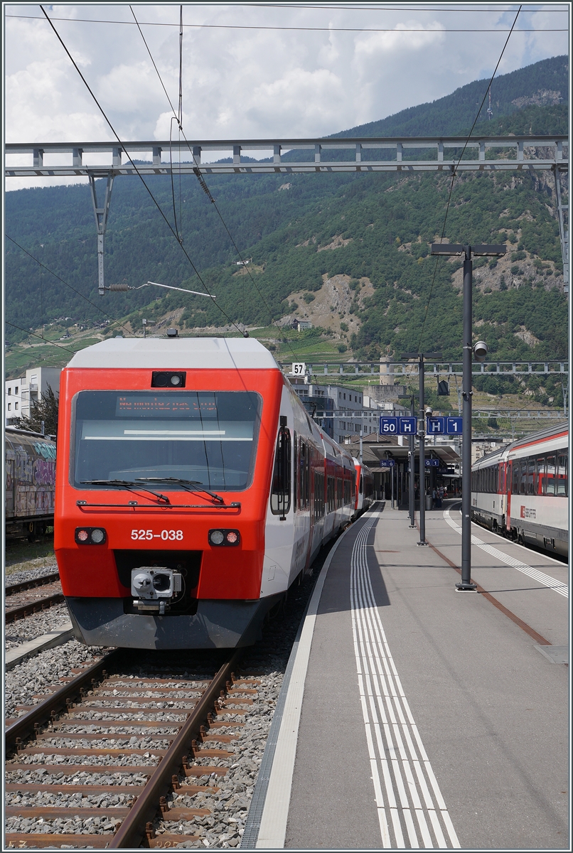 The TMR Region Alpes NINA RABe 525-038, coming from Le Châble, reaches its destination Martigny. With the delivery of the new EVO Flirts, the RABe 525 NINA are likely to be replaced in the near future.

July 11, 2026