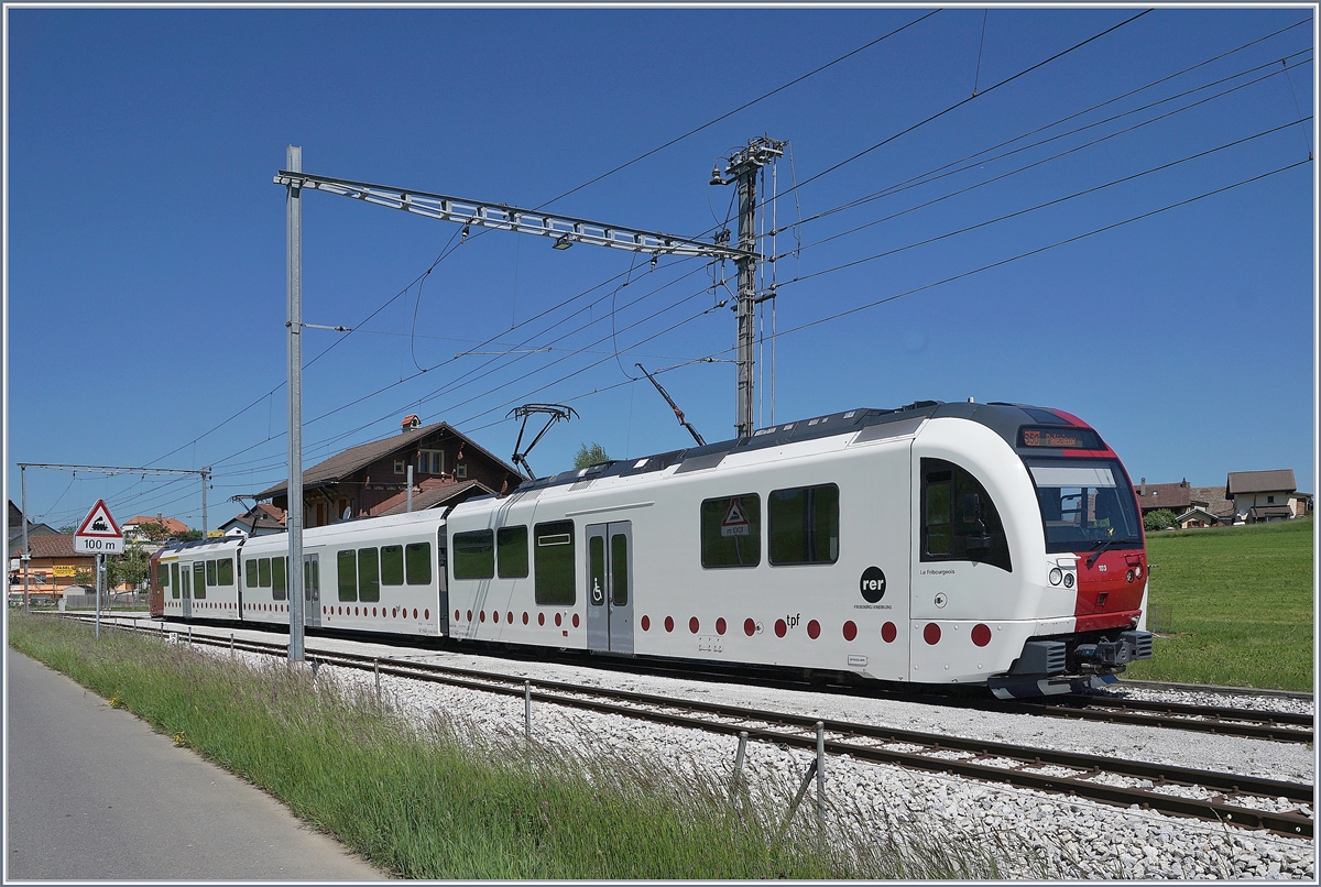 The TPF ABe 2/4 , B, Be 2/4 103 to Palézieux by his stop in Vaulruz Sud. 

19.05.2020