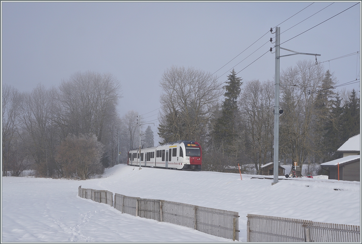 The TPF Be 2/4 -B - ABe 2/4 N° 103 near Semsalens on the way to Palézieux. 

22.12.2021