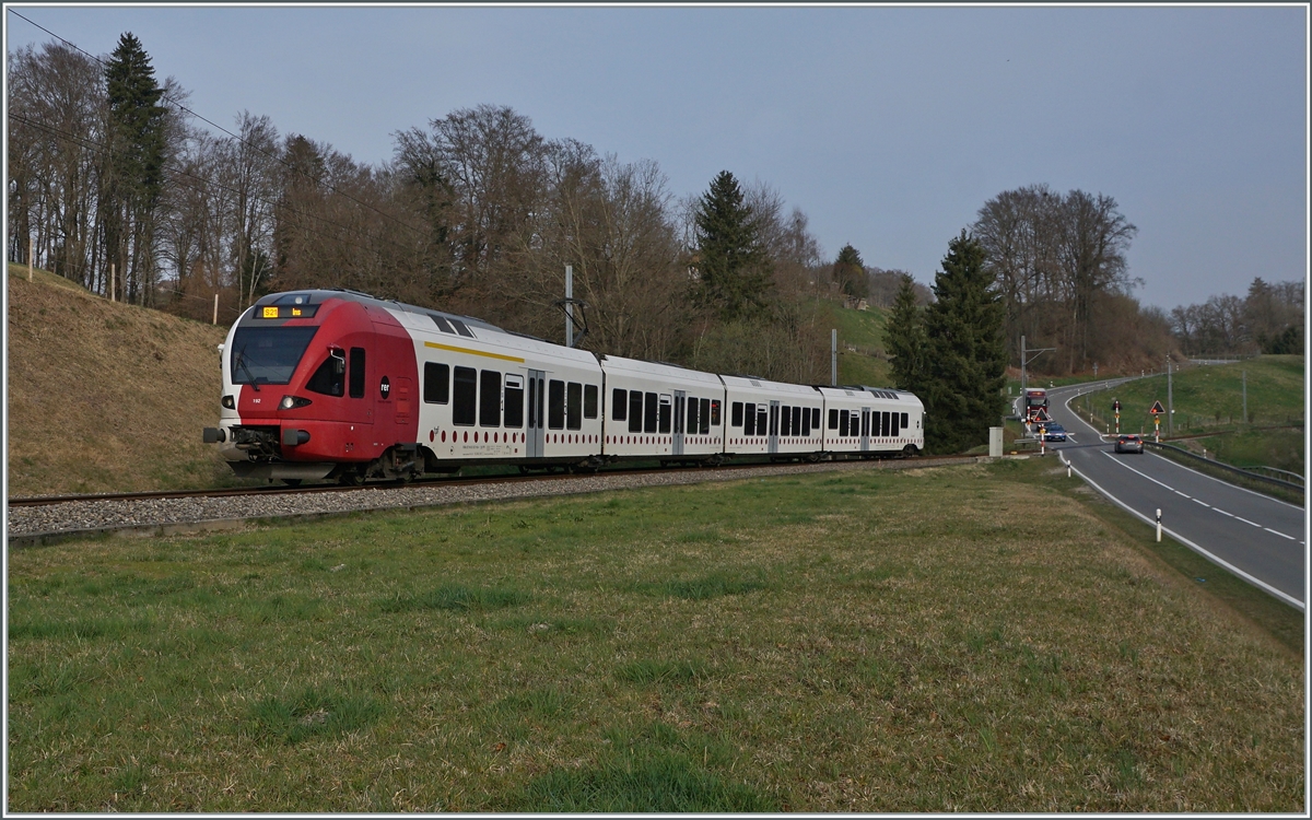 The TPF RABe 527 192 on the way Ins by Pensier.

29.03.2022