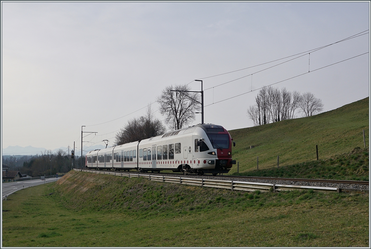 The TPF RABe 527 192 on the way Ins by Pensier. 

29.03.2022