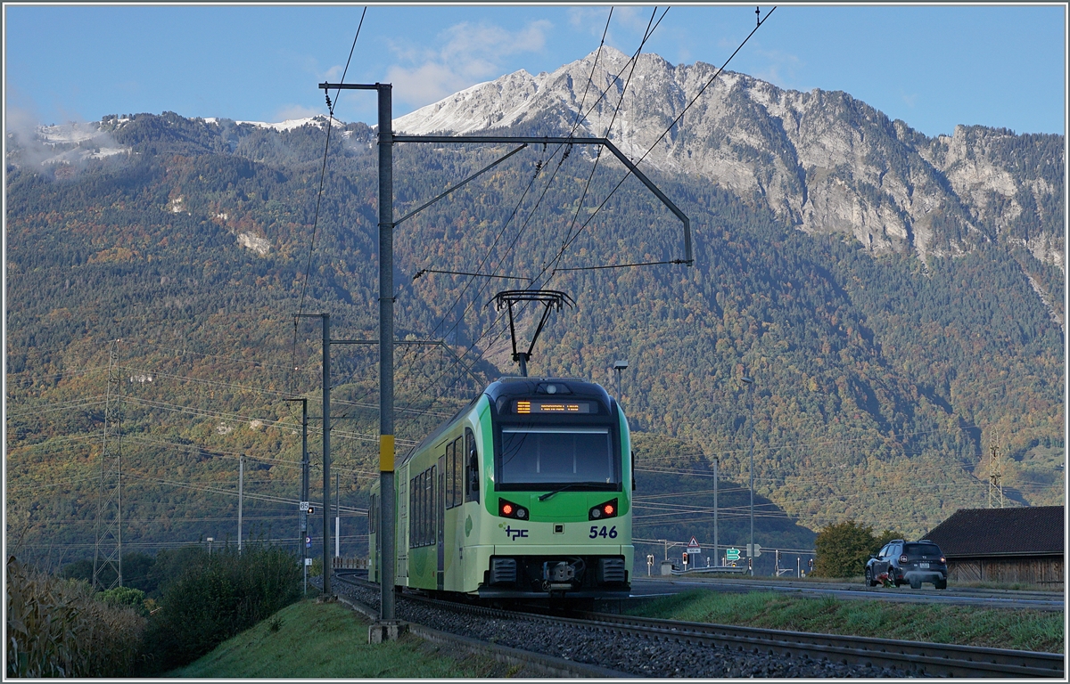 The TPS Beh 2/6 546 on the way to Monthey Ville by the St-Triphon Gare Station. 

12.10.2020