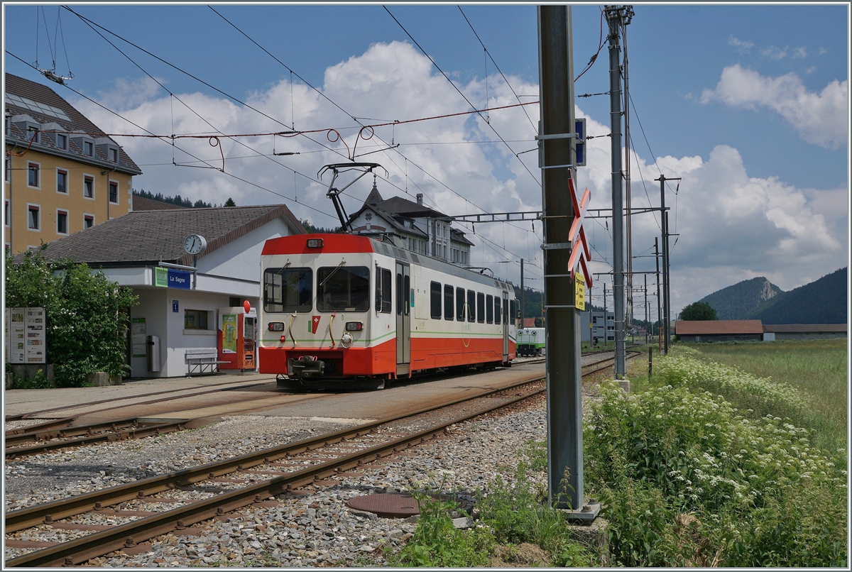 The TransN BDe 4/4 N° 8 is on the way from Les Ponts de Martel to La Chaux de Fonds and makes a stop in La Sagne . 

27.06.2024