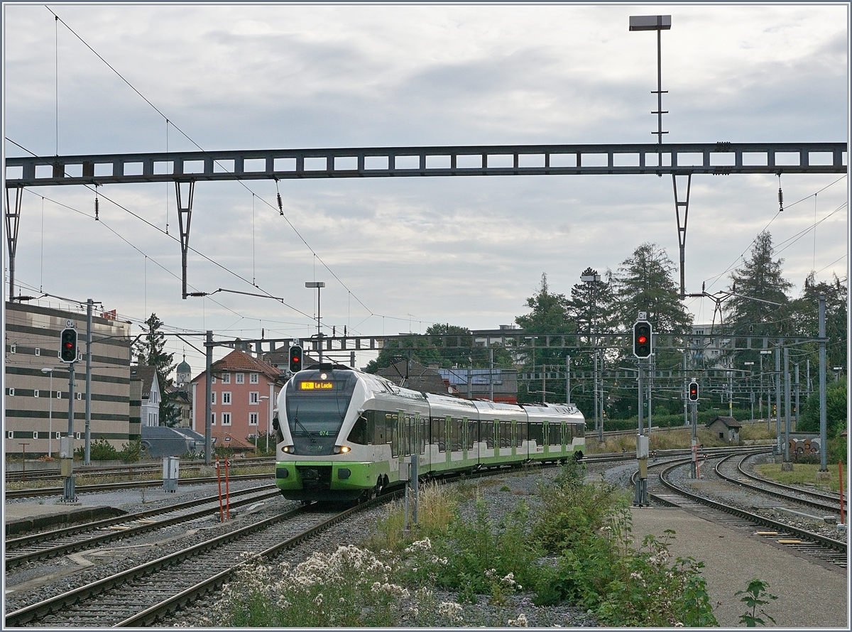 The TransN RABe 523 074 (rented by the SBB) is arriving at La Chaux-de-Fonds. 

12.08.2020