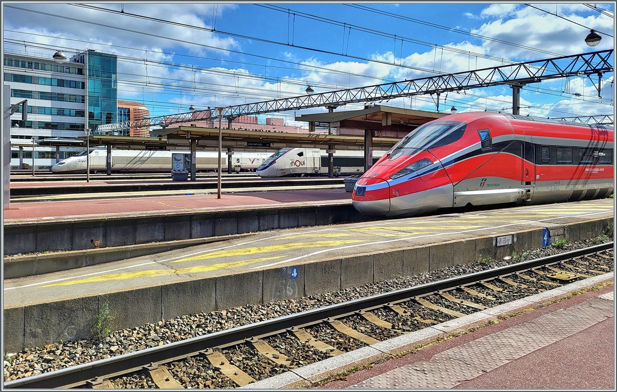 Three high-speed trains from three companies in Lyon Part Dieu: in the foreground the FS Trenitalia ETR 400 031 as FR 664 to Paris Gare de Lyon, in the middle an SNCF inOui TGV Duplex and far in the background the RENFE AVE 100 122 (UIC 9 6 71 9 -100 221-1) to Barcelona Sants.

March 13, 2024