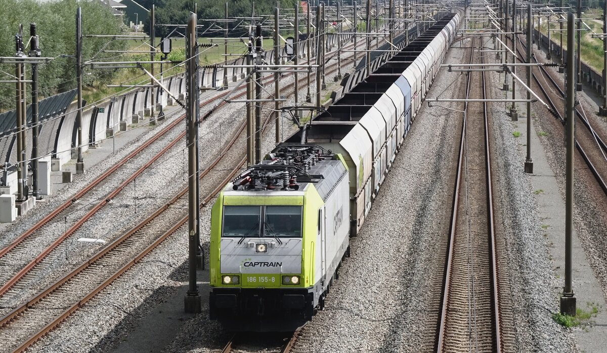 Top shot on CapTrain 186 155 hauling a coal train through Valburg on 18 August 2022.