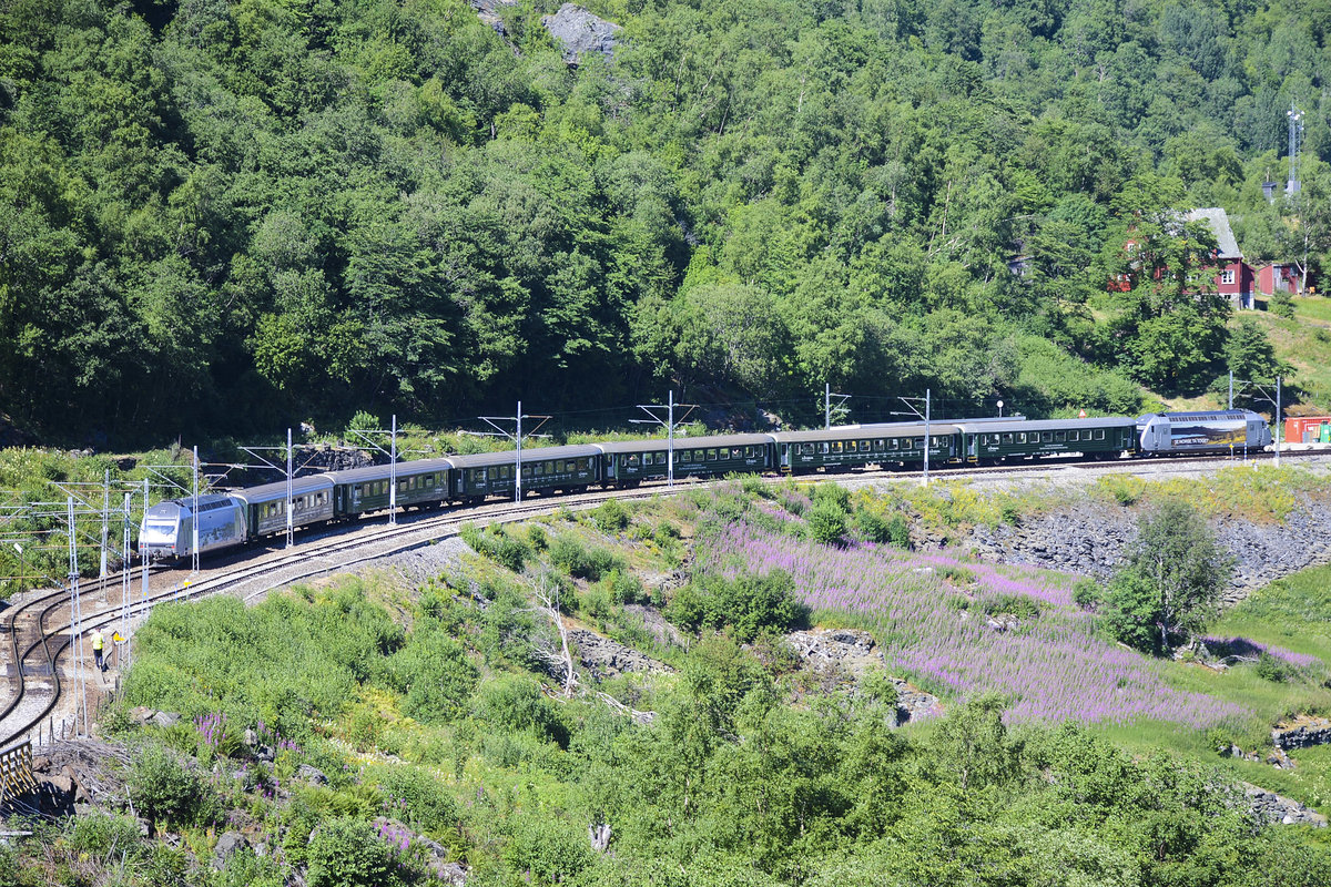 Train at Berekvam Station on the Flåm railway line. The line's elevation difference is 863 meters; it has ten stations, twenty tunnels and one bridge. The maximum gradient is 5.5 percent. Because of its steep gradient and picturesque nature, the Flåm Line is now almost exclusively a tourist service and has become the third-most visited tourist attraction in Norway.
Date: 13 July 2018.