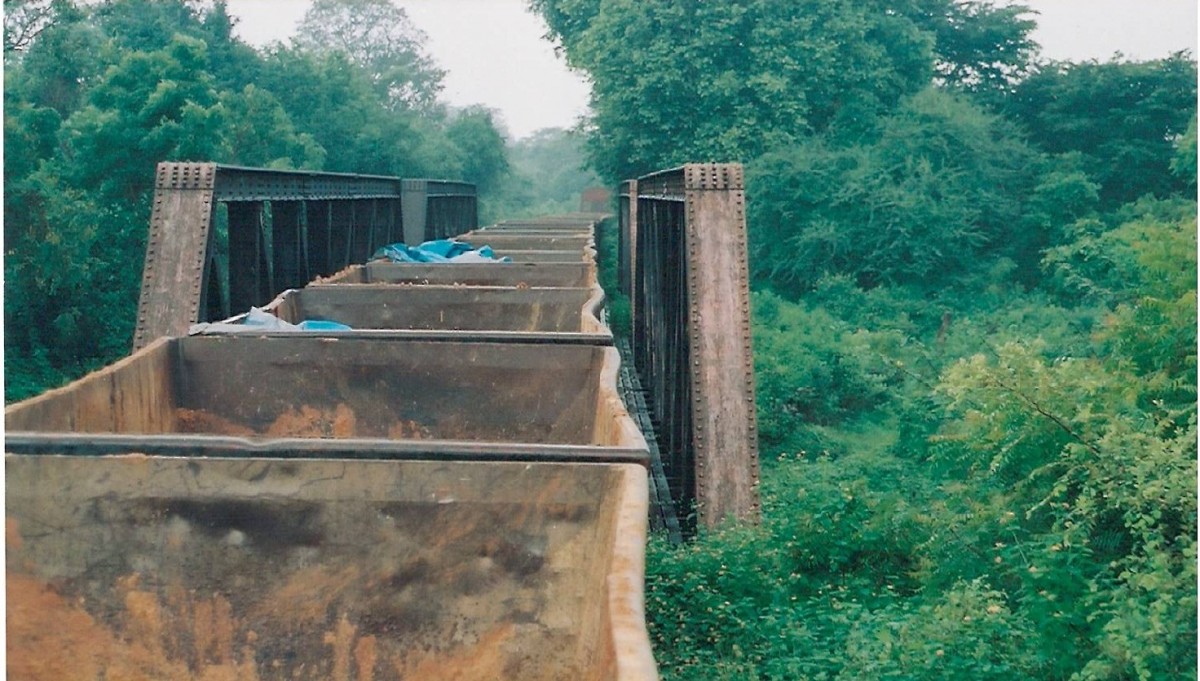 Train travers through a lonely path, on its way to the clinker pit  