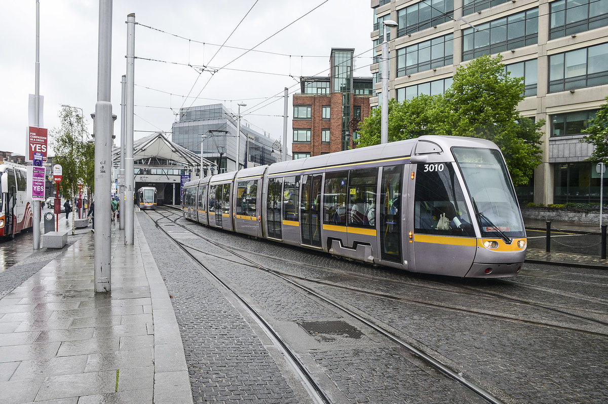 Tram LUAS 3010 at Connolly Station in Dublin (a yellow stripe around the trams has been added to improve visibility. Date: 9 May 2018.