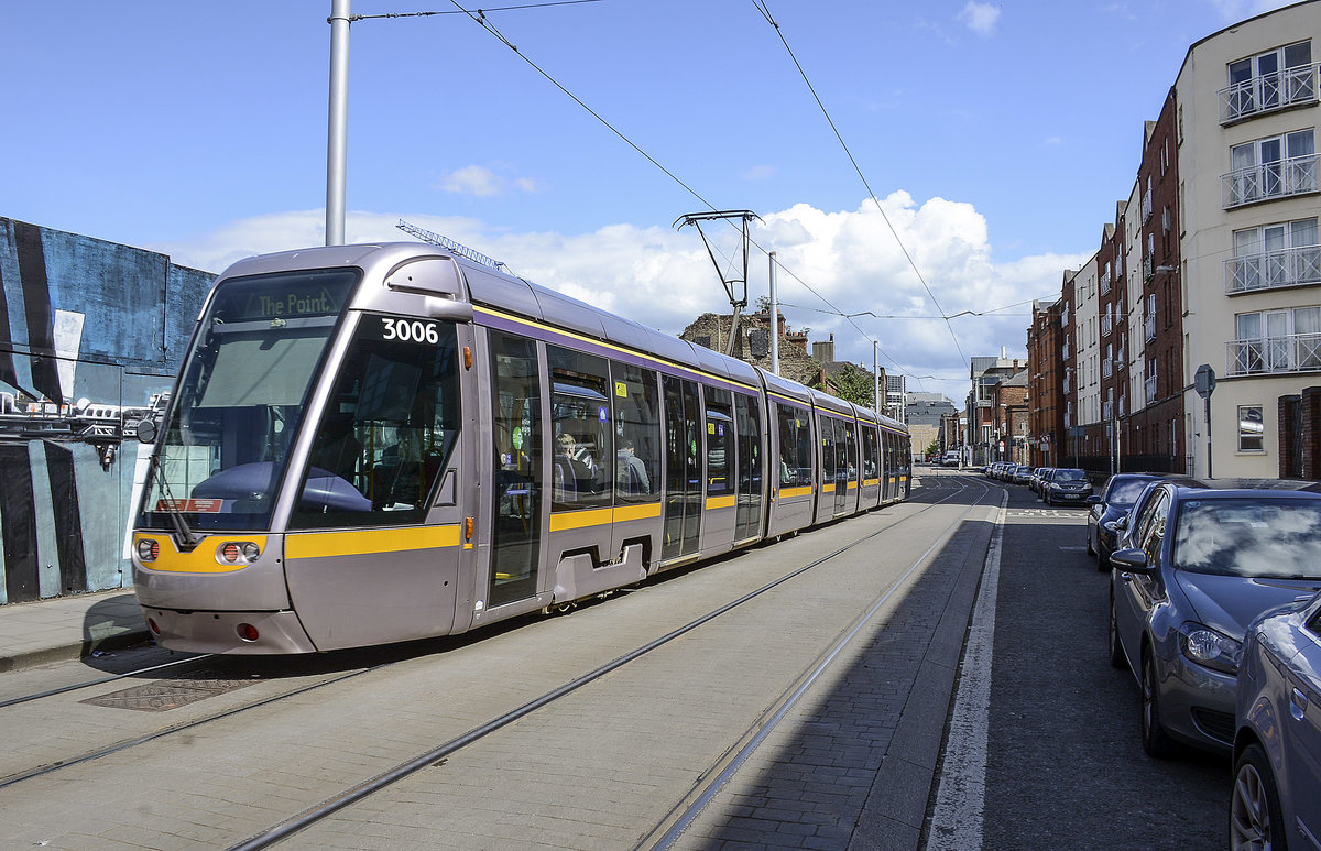 Tram LUAS Citadis 3006 in Bernburb Street of Dublin. The LUAS-system now has sixty-seven stations and 36.5 kilometres of revenue track, which in 2017 carried 37.6 million passengers. Date: 11 May 2018.