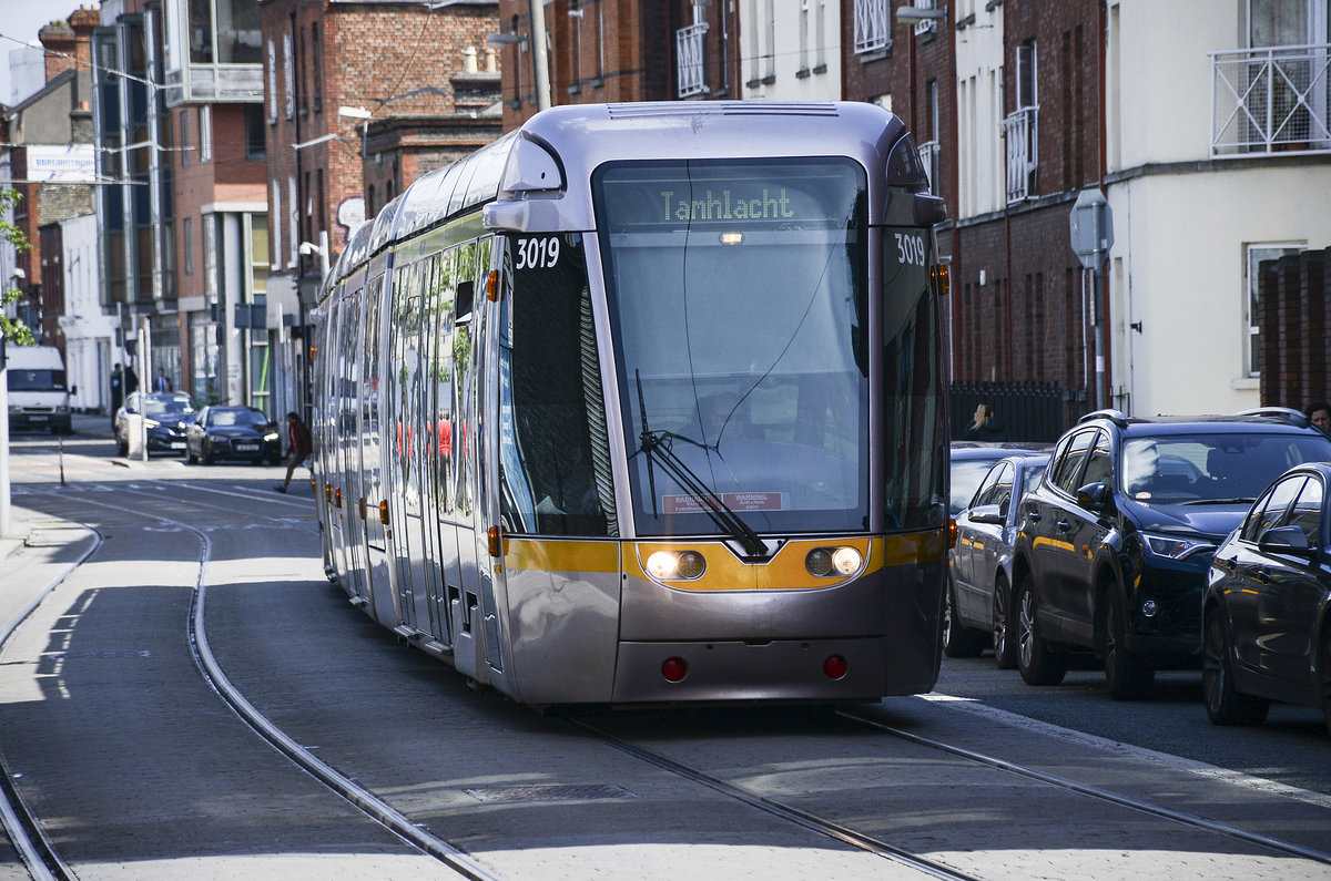 Tram LUAS Citadis 3019 in Bernburb Street of Dublin. The initial 3000 class trams are 30m long Citadis 301 configurations with a capacity of 256. Date: 11 May 2018.