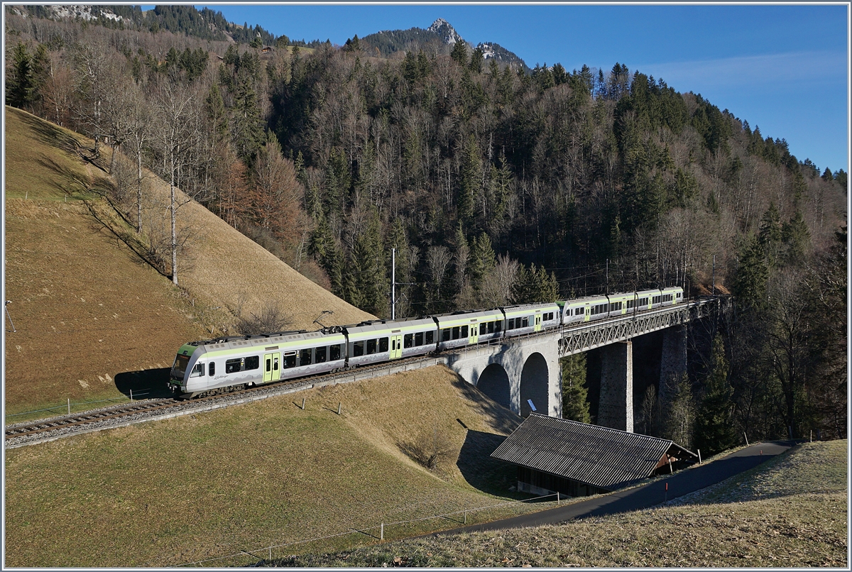 Two BLS Lötschberger RABe 535 the way to Zweisimmen on the Bunschenbach Bridge near Weissneburg. 

12.01.2020