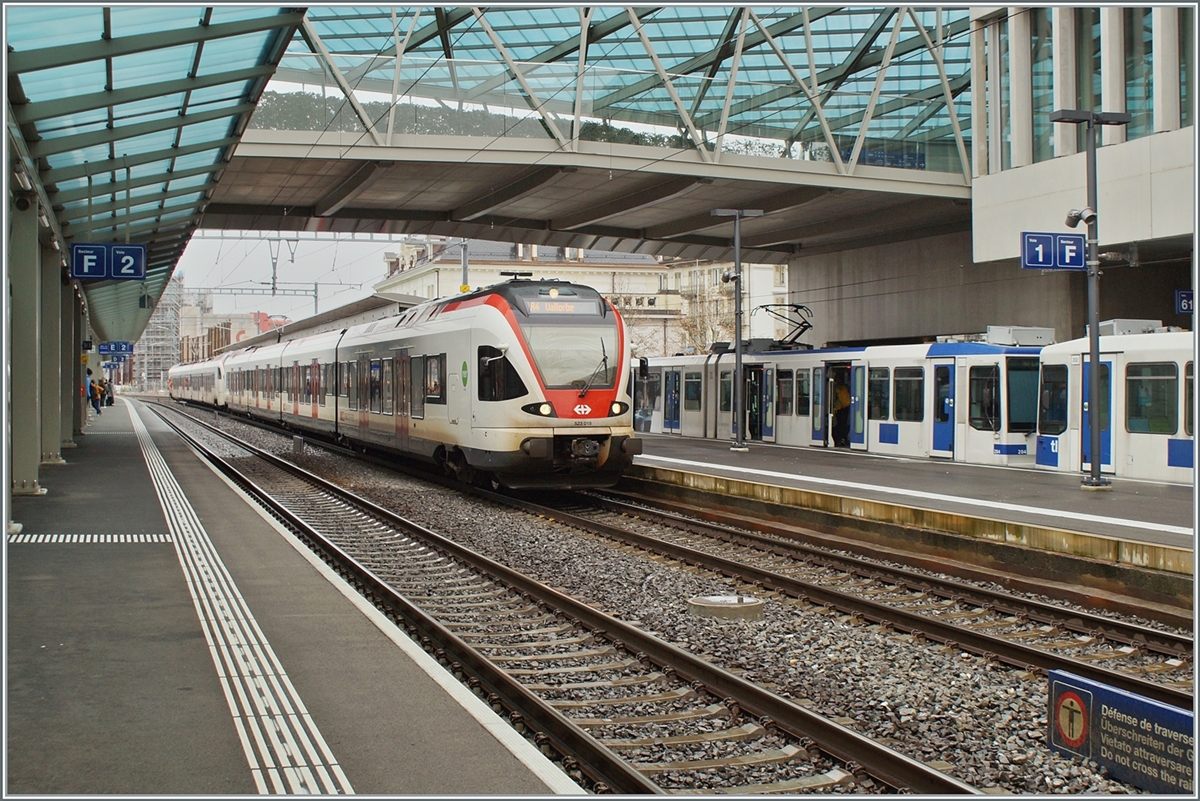 Two Flirts are in Renens VD on the way to Vallorbe and Le Brassus (the train separates in Le Day). What's interesting is that two different flirt types are used here, and the flirt at the back is even a  long-distance  flirt.
Dec 14, 2023