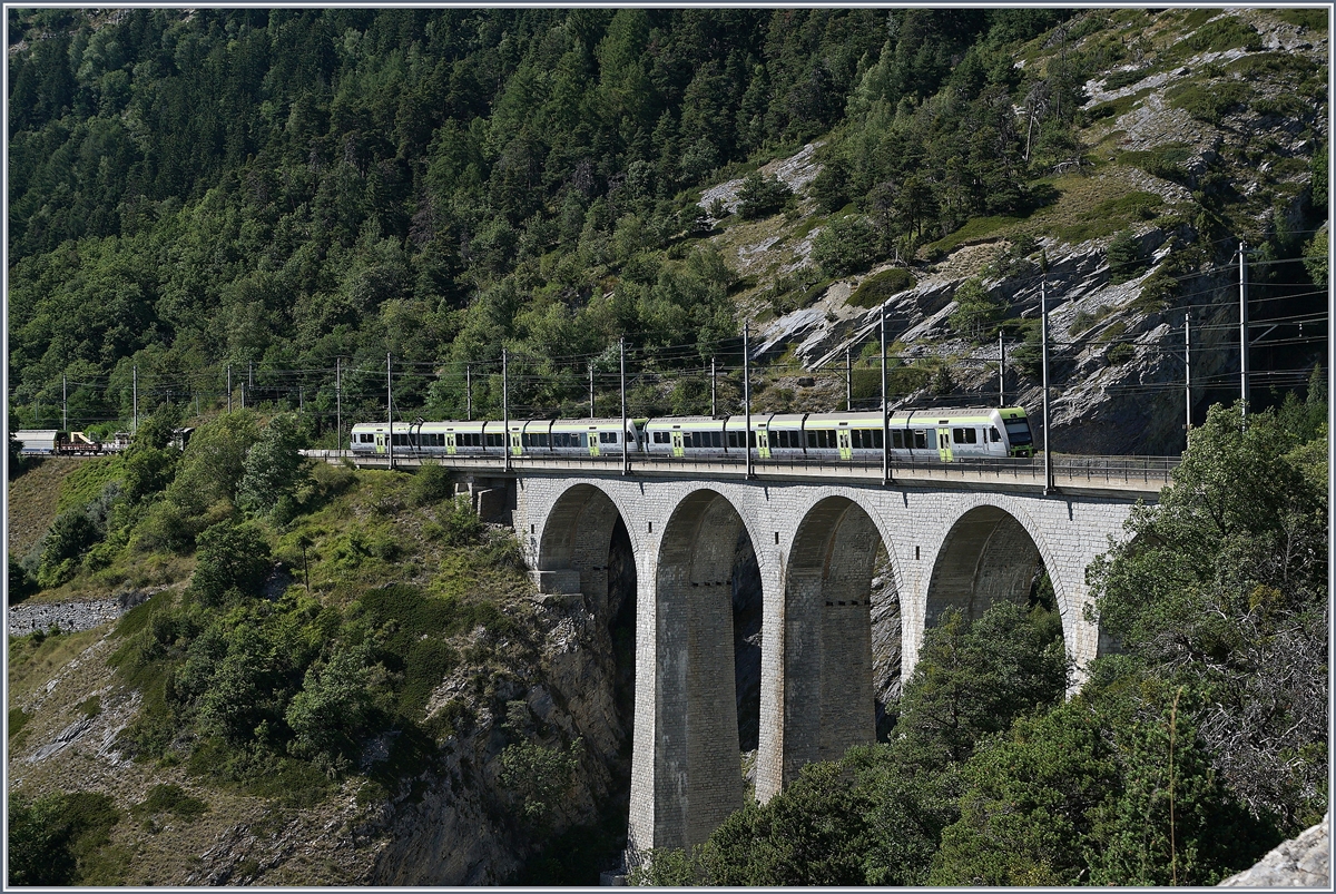 Two  Lötschberger  of the Lueglkinn-Bridge by Hohtenn.
