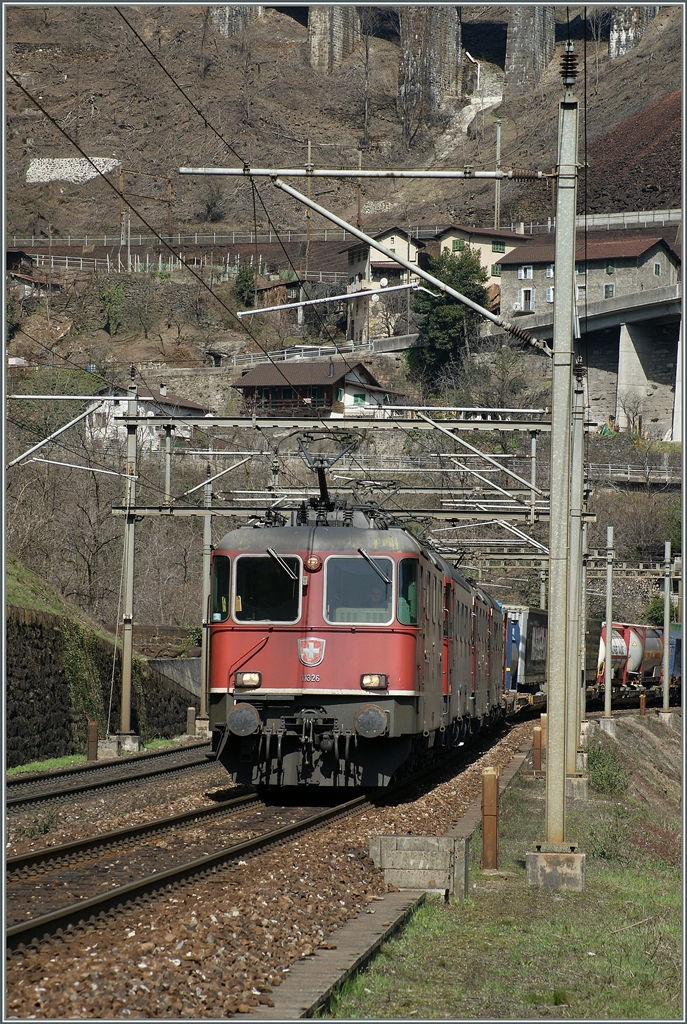 Two  Re 10/10  with a Cargo train in the  Biaschina  (Gotthard South Line). 
03.04.2013