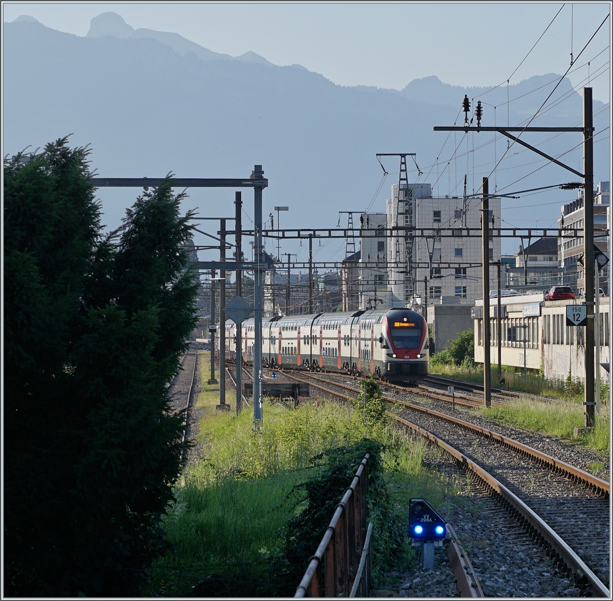 Two SBB RABe 511 leave Vevey towards Annemasse. The picture was taken from the train platform in Vevey-Funi.

July 20, 2021