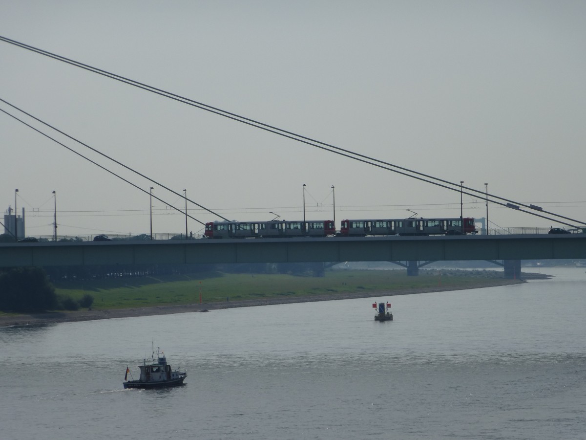 Two trams are driving on the Severinbridge in Cologne on August 21st 2013.