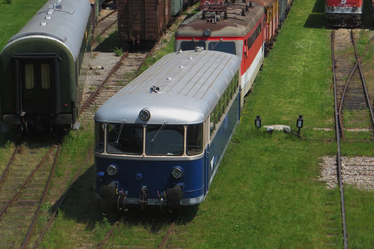 View from a bridge -on 21 May 2023, ex-ÖBB Schienenbus 5081.15 was seen at the Heizhaus Strasshof.