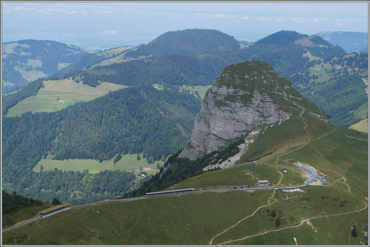 View from the Rochers the Naye on the Dent de Jaman and the Jaman Station wiht a Beh 4/8 ont the way to the summit.

04.09.2014