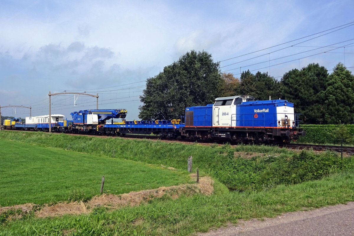 Volker Rail 203-4 hauls an engineering train through Hulten on 16 August 2019.