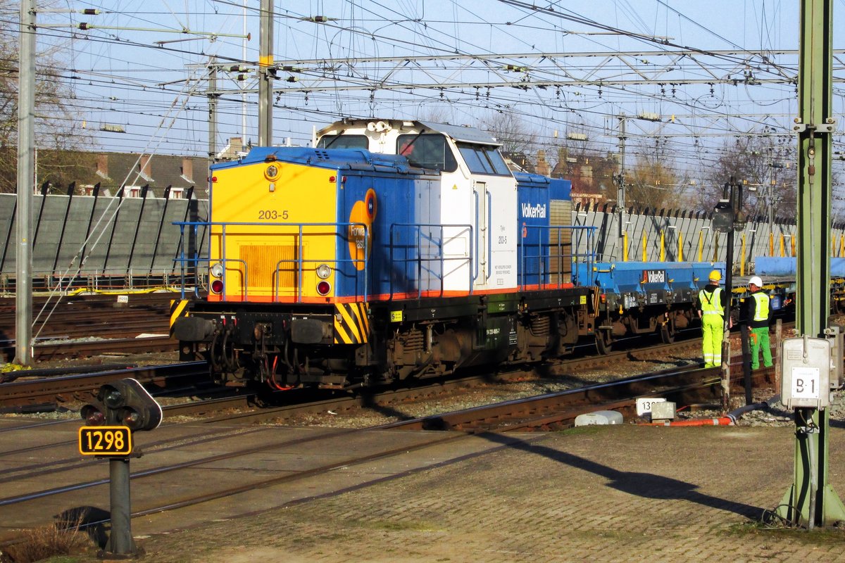 Volker Rail 203-5 at work in Utrecht Centraal during a local realignment on 9 March 2014.