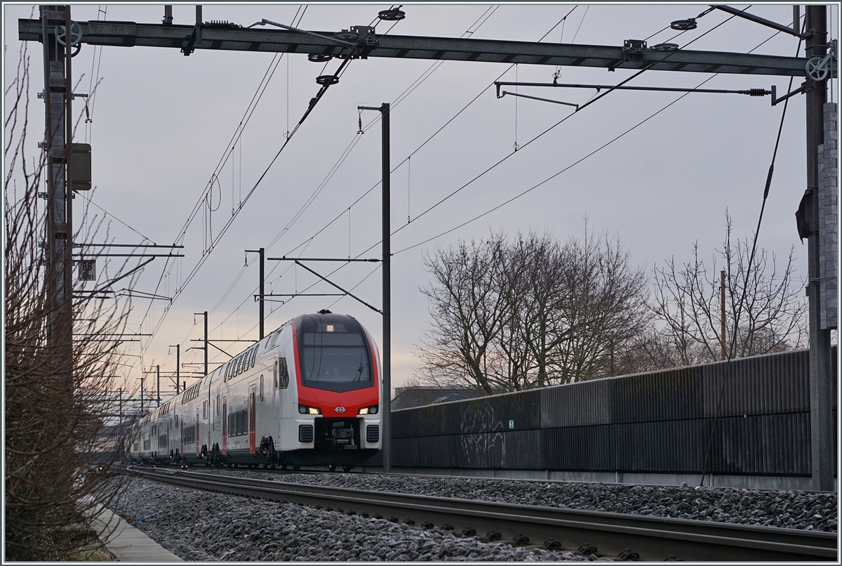 With the reintroduction of direct ICE trains from Basel SBB to Lausanne, SBB RABe 512 trains have taken over service on the  new  connecting line from Biel/Bienne to Lausanne.

The picture shows an IR 55 from Zurich to Biel/Bienne shortly after departing Grenchen Süd.

January 13, 2026