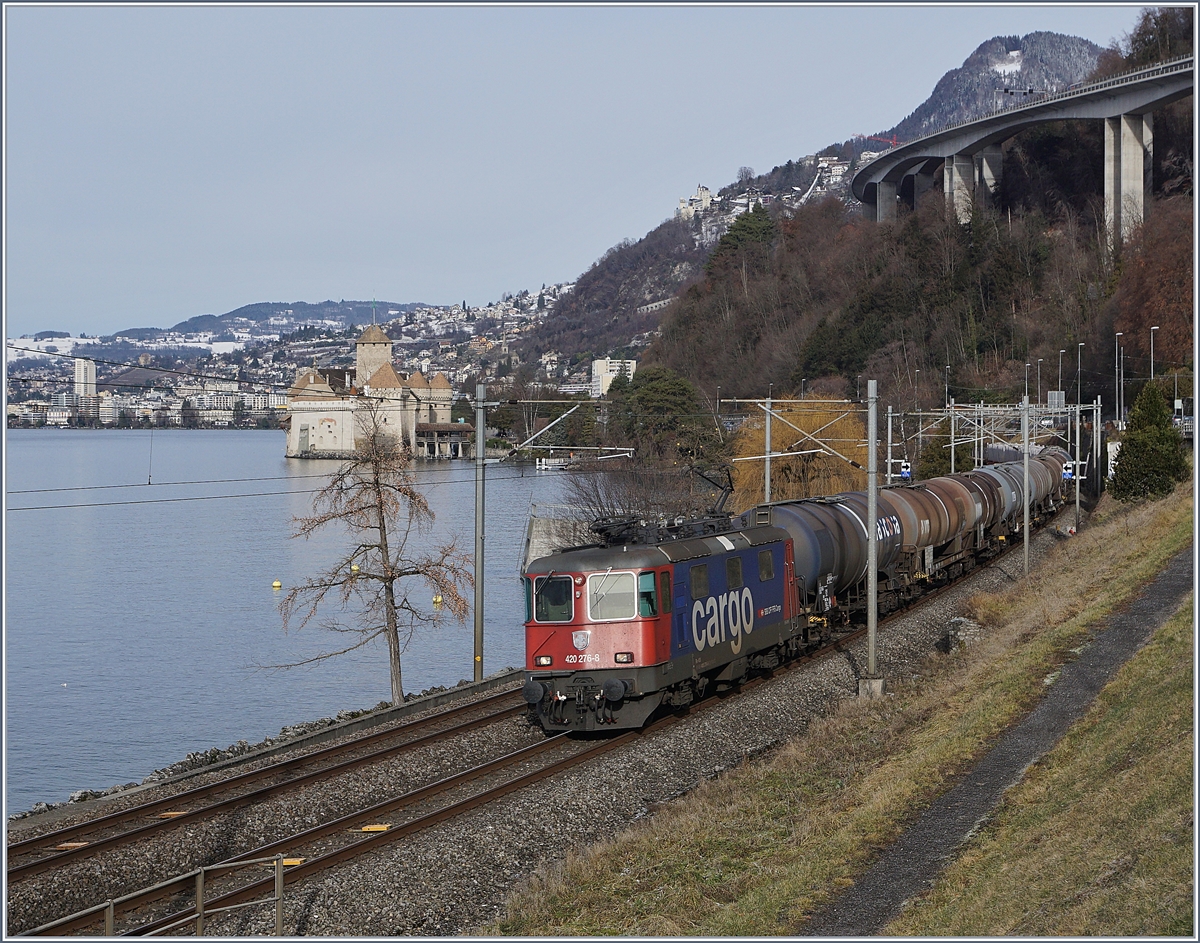 With the SBB Re 4/4 II 11276 (Re 420 276-8) at the front, a freight train is traveling towards St Triphon.  
Date of recording unknown