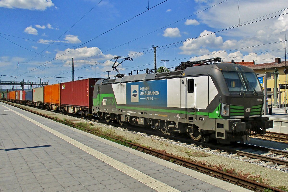 WLC 193 223 hauls a container train through Passau on 6 May 2016.