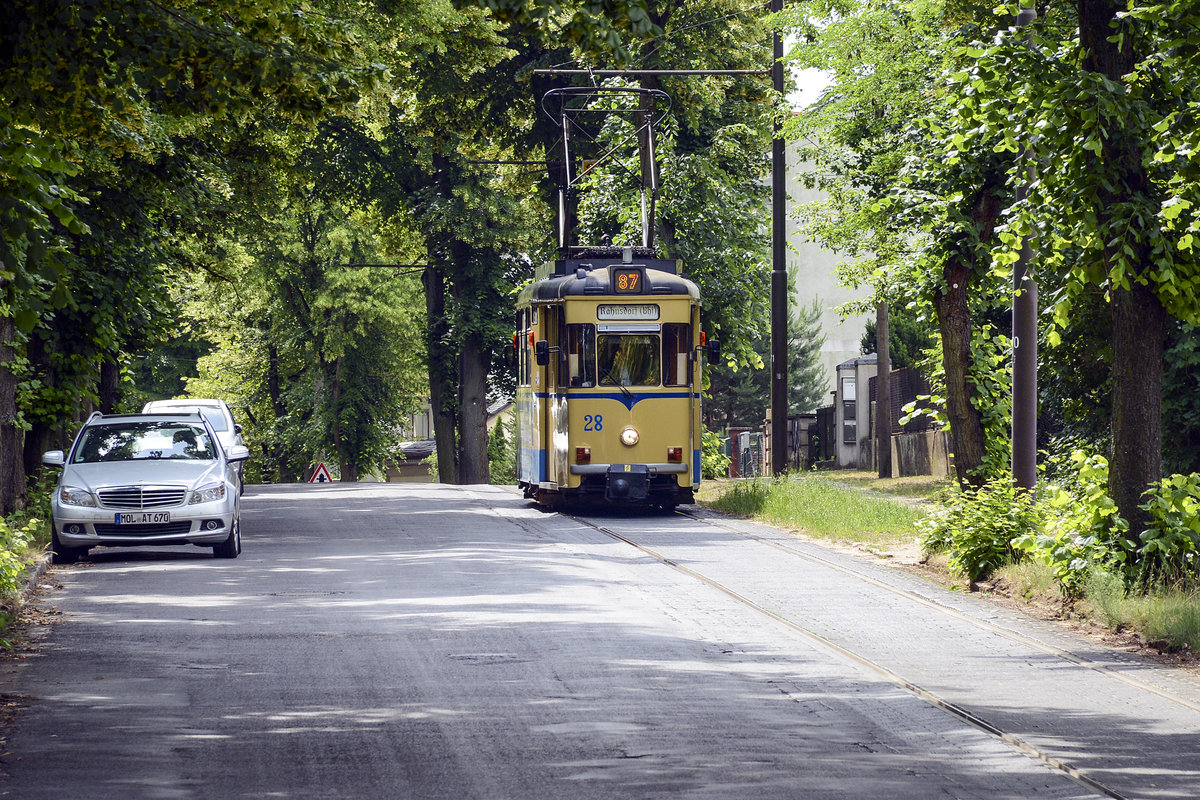 Woltersdorfer Straßenbahn southeast of Berlin - Tram no. 28 - Line 87 in Schleussenstraße in Woltersdorf. Date: 10 June 2019.