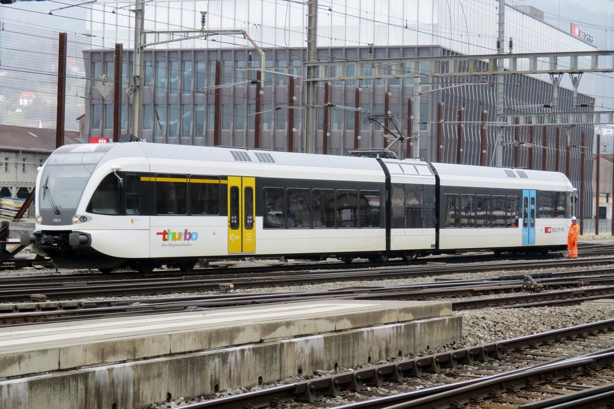 Yellow door: ThurBo 746-3 runs light at Olten on 24 March 2017.