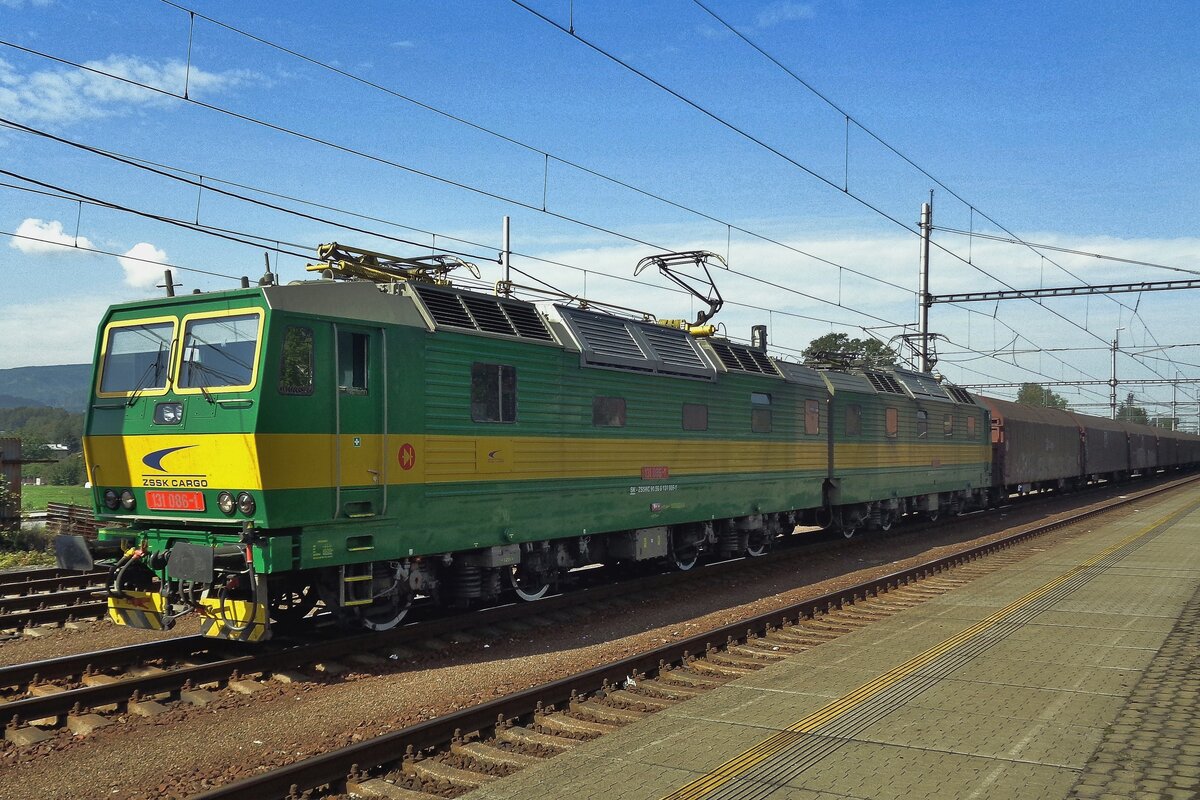 ZSSK 131 086 hauls a steel train at navsi on 13 September 2018.