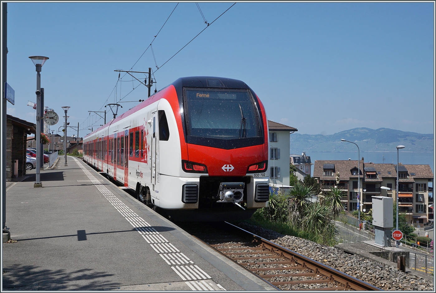 At the St-Gingolph terminus, located on the border with France, the variety of rolling stock is rather limited. However, over time, a number of different types have accumulated; I wouldn't go all the way back to the C 5/6 series, but from the BDe 4/4 and NINA trains to the Domino series, there has been quite a bit to see here. Until last year, BLS RABe 528 MIKA trains were also used here once a day (on weekdays), but with the commissioning of the new EVO Flirt trains, this is now a thing of the past. Instead, these new EVO trains are now seen more frequently in St-Gingolph: The picture shows Region Alpes RABe 533 702 (RABe 94 85 0 533 702-2 CH RA), which arrived in St-Gingolph as R91 6118 from Brig (14:06) and will return to Brig as R91 6123 (departing at 14:51). In the meantime, the train is being cleaned, or rather, photographed by me.

May 26, 2026