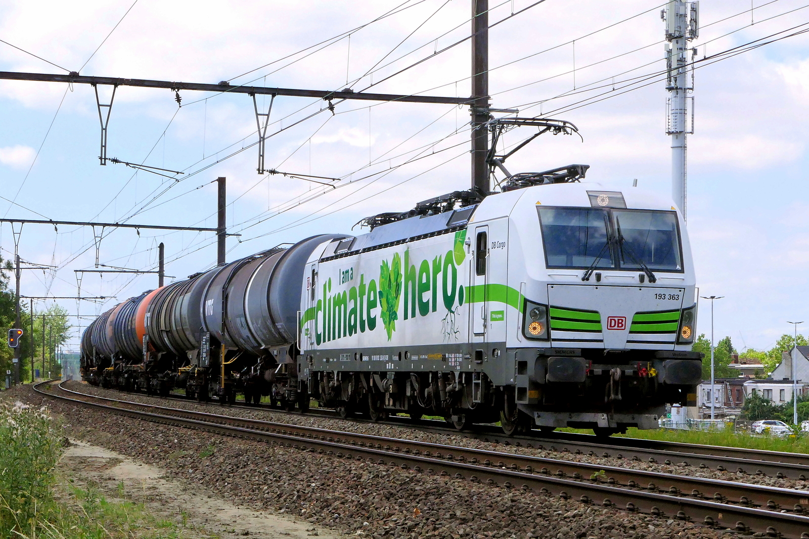 The DB Cargo 193 363  I am a climate hero  with a tank train from the port of Antwerp to Germany. Siemens Vectron MS build in 2019 with construction N� 22609. Line 27A at Antwerp Airport. 08-07-2026