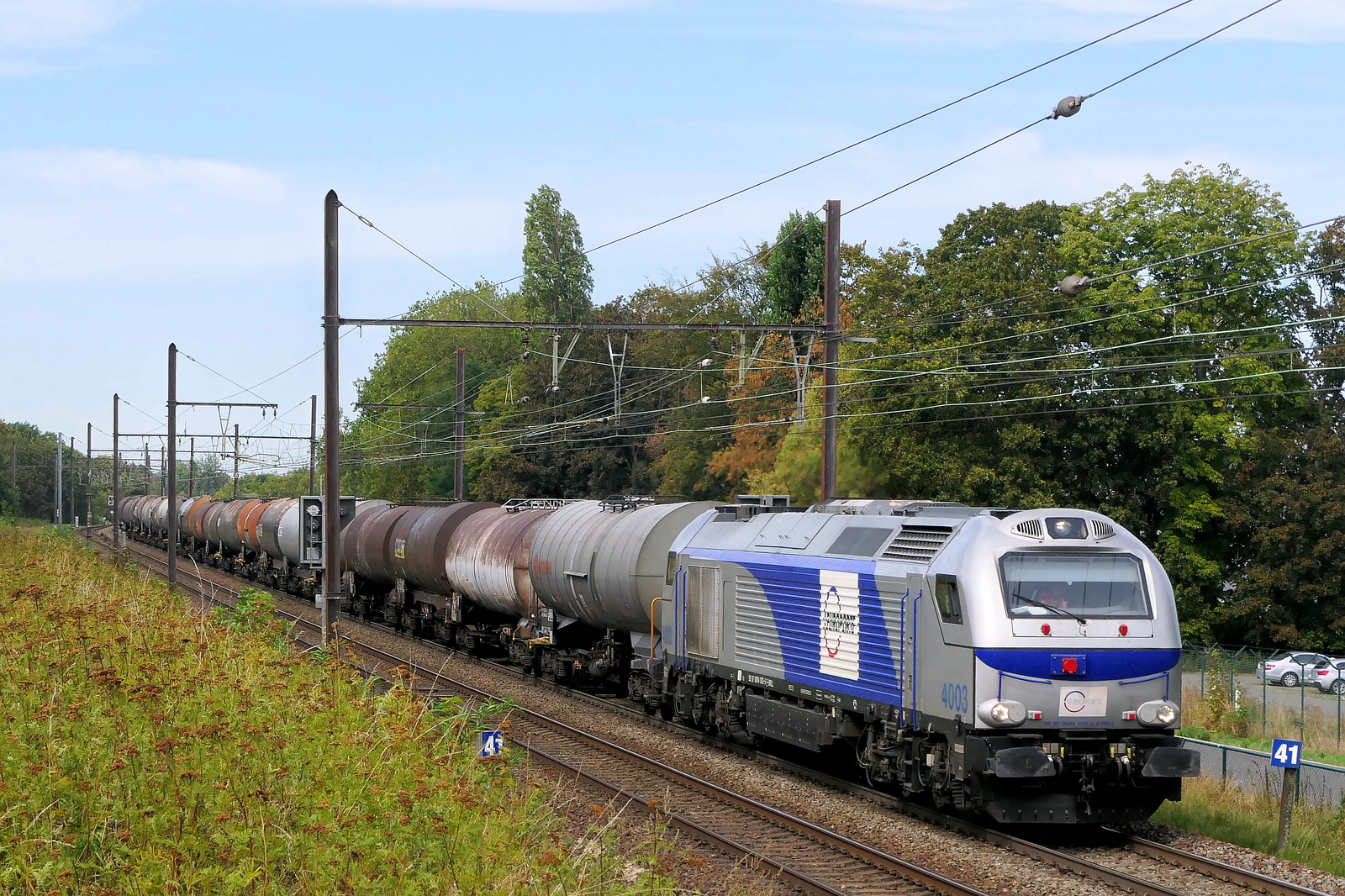 The Europorte 4003 with a tank train from the port of Antwerp to France. Vossloh-Stadler Euro4000 build in 2009 with construction N� 2507. Line 27A at Antwerp Airport. 25-08-2026