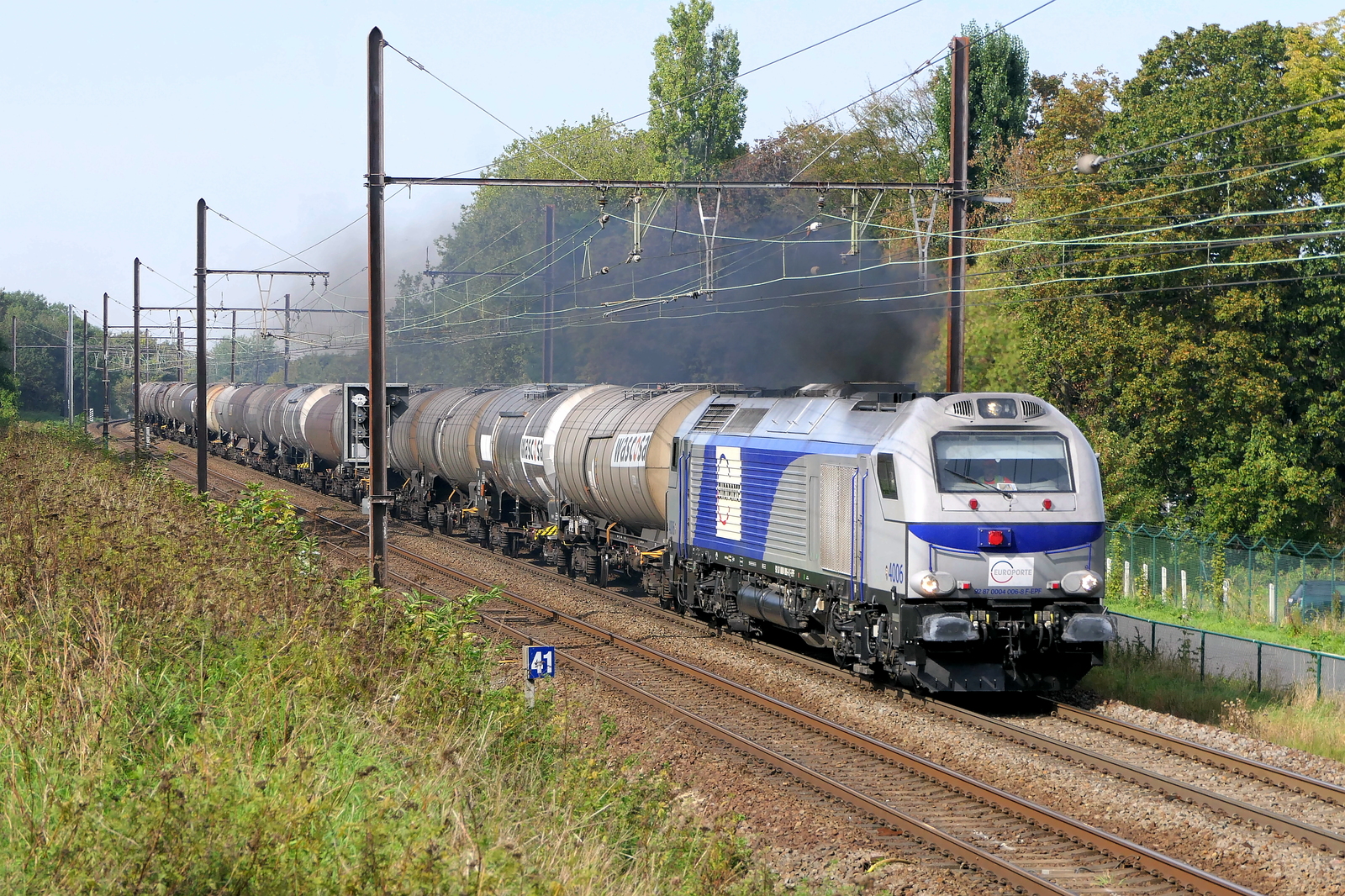 The Europorte 4006 on route from the port of Antwerp to France, full power accelerating. Looks like a steam locomotive. Vossloh-Stadler Euro4000 build in 2011 with construction N� 2510. Line 27A at Antwerp Airport. 29-09-2026