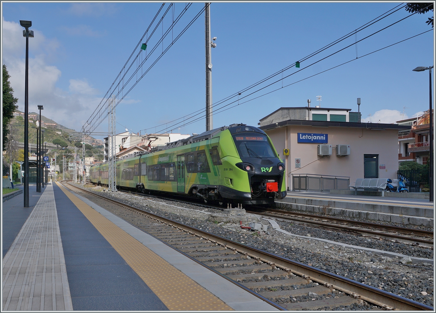 The FS Trenitalia Coradia Stream Pop ETR 104 278 is operating as regional train 12978 from Catania to Messina and has reached Letojanni where a crossing must be awaited. The multiple unit is shown in the new FS Trenitalia regional train colors.

March 11, 2026