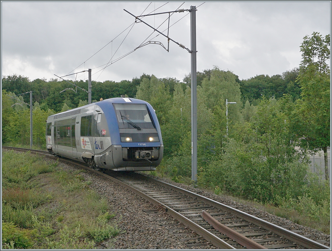 The SNCF X 73756 is operating as a TER from Delle to Belfort and is arriving at Meroux. 

May 20, 2026