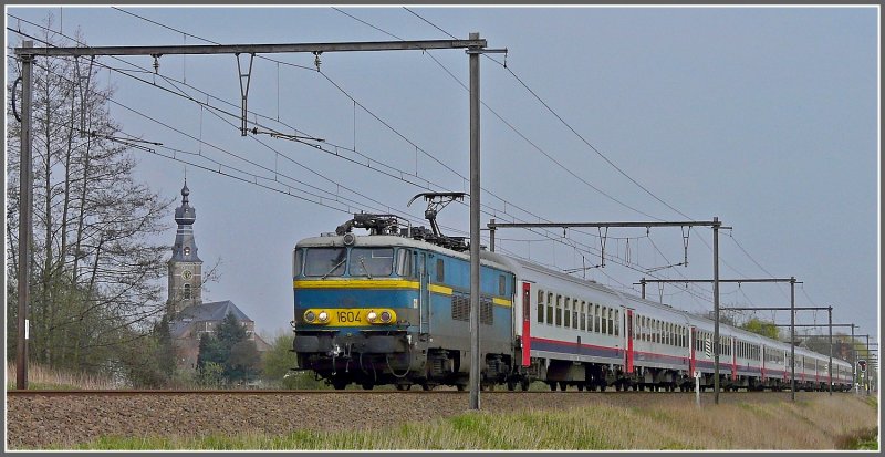 1604 is hauling a P train past the beautiful church of Hansbeke on its way from Schaerbeek to Oostende on April 10th, 2009.